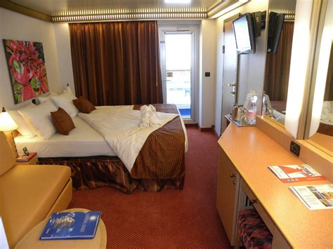 Immerse yourself in luxury with a Carnival Magic outside cabin